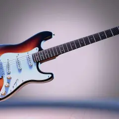 Chitarra elettrica sunburst con sei corde, pronta per suonare.