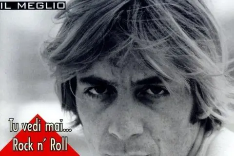 Primo piano di Riki Maiocchi, con testo "Il Meglio". La sua espressione intensa evoca il mistero sulla riki maiocchi causa morte.