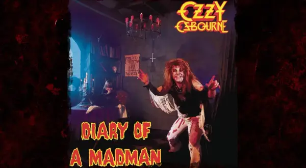 Ozzy Osbourne, con trucco da clown e capelli scompigliati, posa in una stanza buia. Il titolo "Diary of a Madman" è in primo piano.