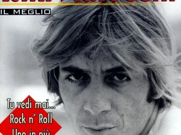 Primo piano di Riki Maiocchi, con testo "Il Meglio". La sua espressione intensa evoca il mistero sulla riki maiocchi causa morte.